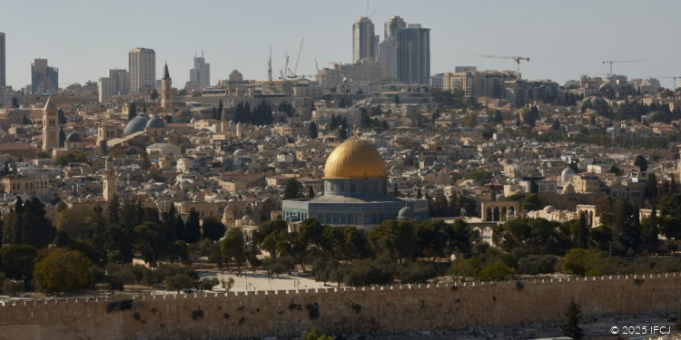 Panoramic view of Jerusalem featuring the Dome of the Rock and surrounding historic buildings.