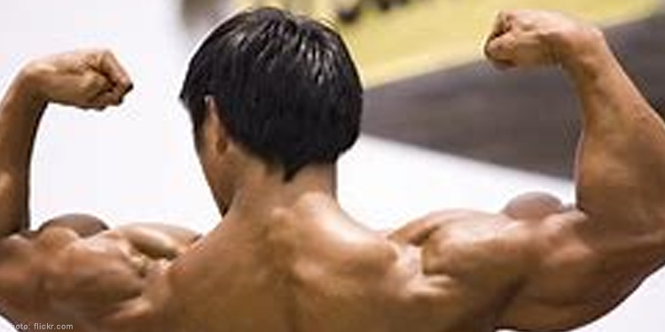 Image of a man flexing his muscles