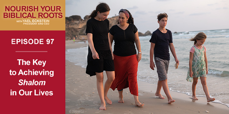 Yael and her children on the beach.