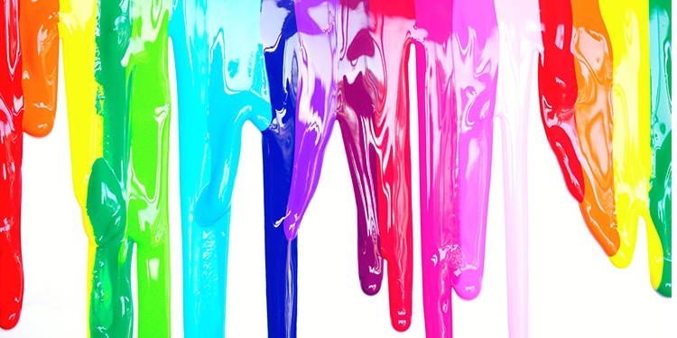 Paint dripping down on a white background.