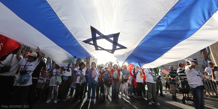 People standing with Israeli flag