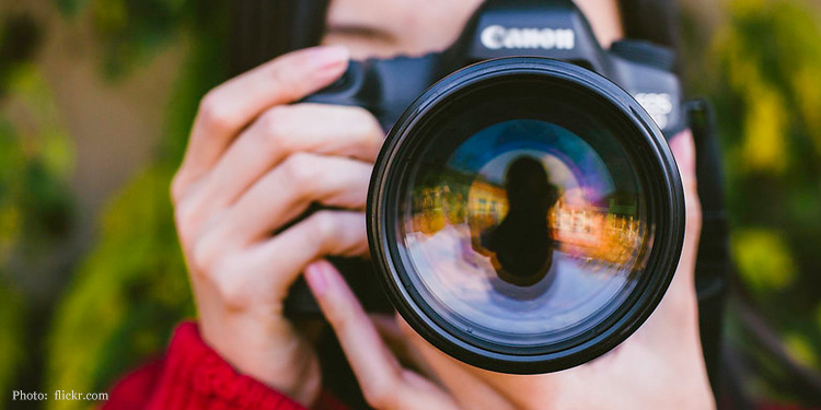 Woman holding a camera