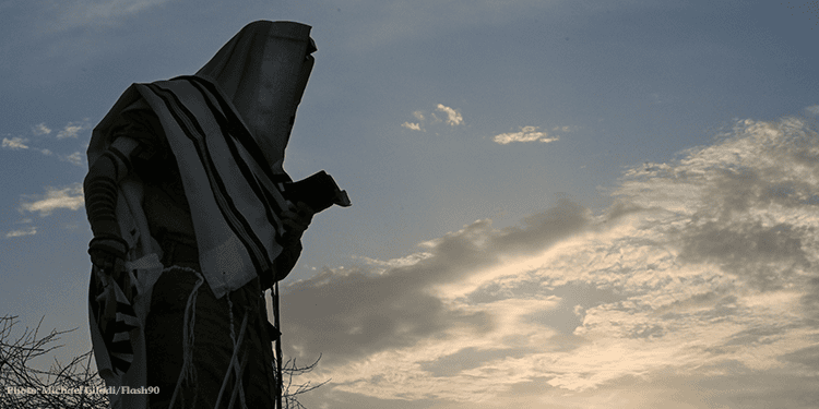 Israeli soldiers seen during a morning prayer