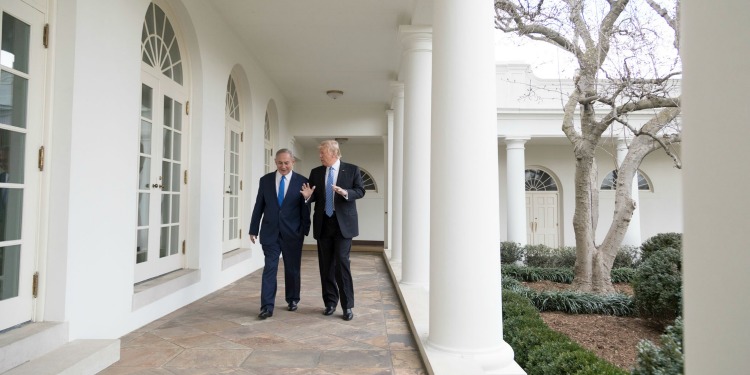 President Donald Trump and Israeli Prime Minister Benjamin Netanyahu walk along the Colonnade