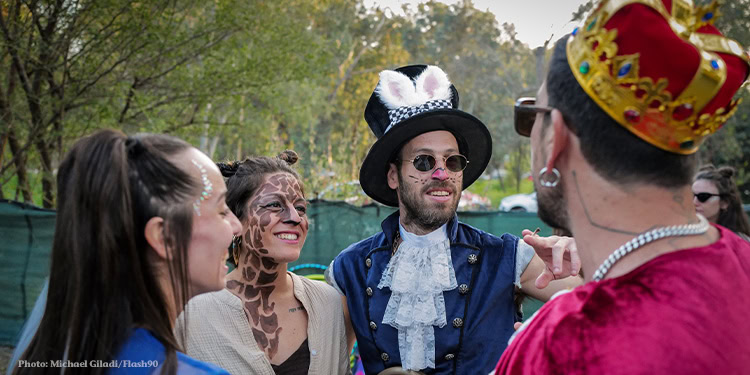 Israelis dance at the Shamba Looloo Purim Gathering Psy-Trance Rave at Park Hayarden near the Sea of Galilee in northern Israel on March 22, 2024. Photo by Michael Giladi/Flash90