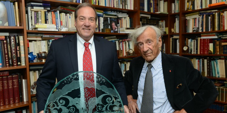 Rabbi Eckstein and Raoul Wallenberg standing together inside a library.