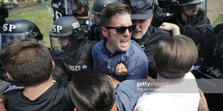 Neo-Nazi Richard Spencer dragged away by police