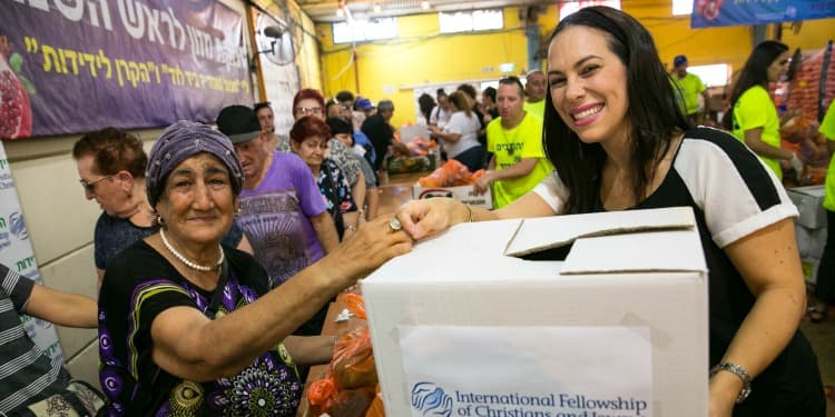 Yael distributing Rosh Hashanah food boxes