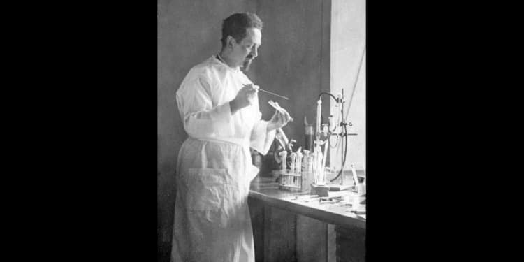 Dr. Rudolf Weigl working in lab.