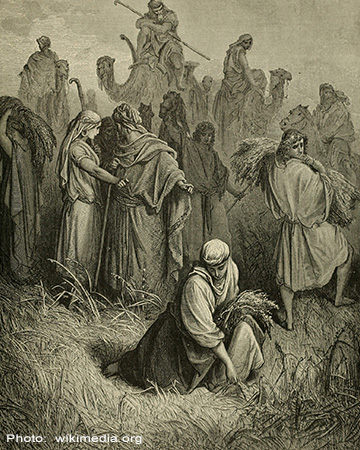 Black and white drawing of people gathered in a field.