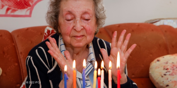 Bella, Holocaust survivor celebrating Hanukkah holiday
