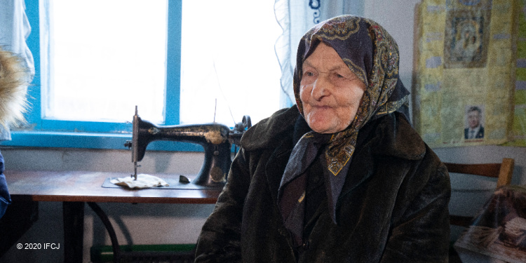 Holocaust survivor Dominca with sewing machine