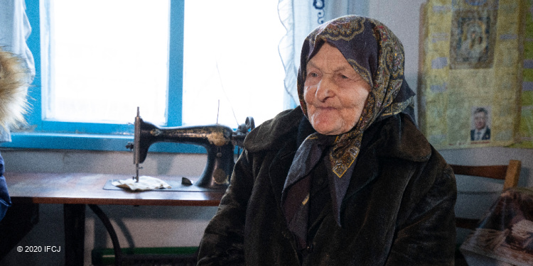 Holocaust survivor Dominca with sewing machine