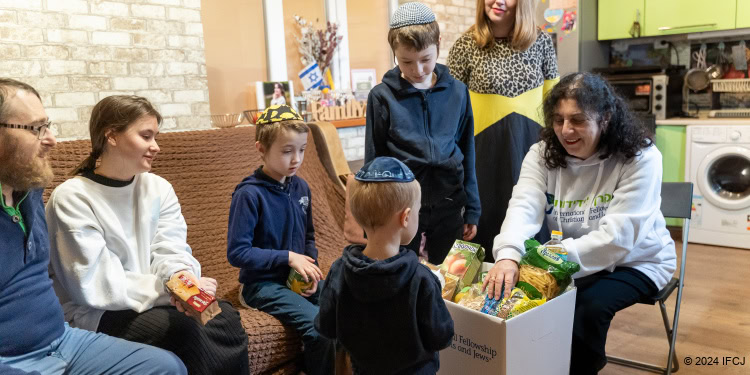 Family in war-torn Ukraine receives food box from The Fellowship.