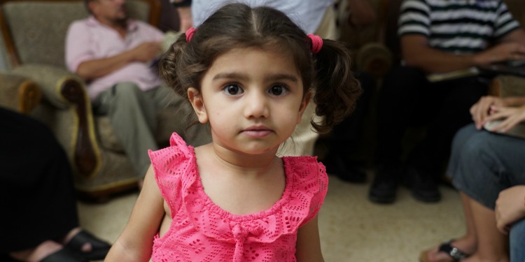 Young Jordanian girl in pink dress