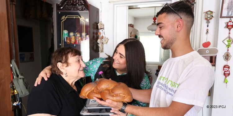 Vera, an elderly Holocaust survivor during rocket attacks receives visit from her 