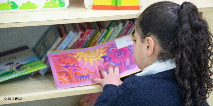 Israeli girl in school who The Fellowship helps out of poverty