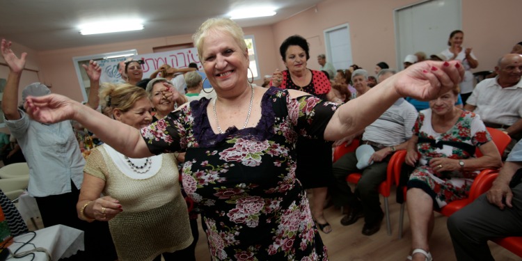 Elderly woman from Sderot club smiling