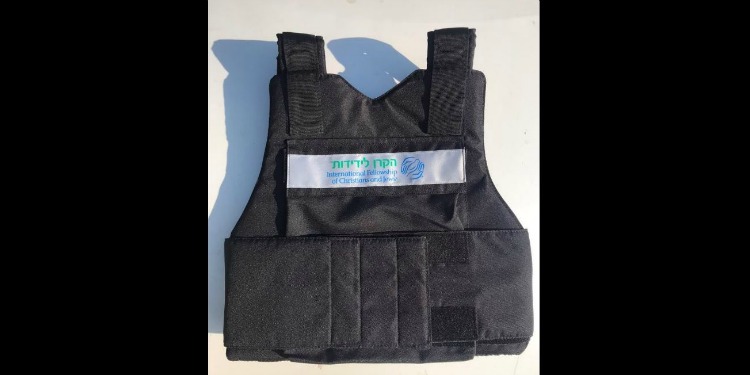 Israeli security vest with tag and IFCJ logo across the chest