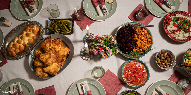 Sabbath meal on the table with the challah bread.