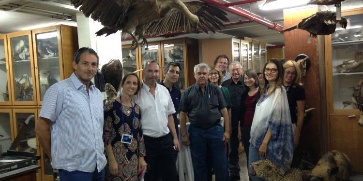 Several people gathered together at the Steinhardt Museum of Natural History.