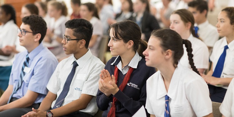 Students paying attention to the front of a classroom in Israel