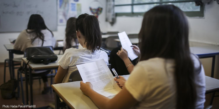 Grade 12 students have a last review class before taking their Mathematics final exam, at the Dekel Vilnai Highschool in Maaleh Adumim, south of Jerusalem, on May 20, 2015.