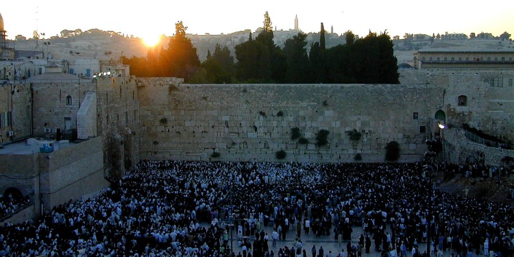 Sunrise coming up behind the Western Wall.