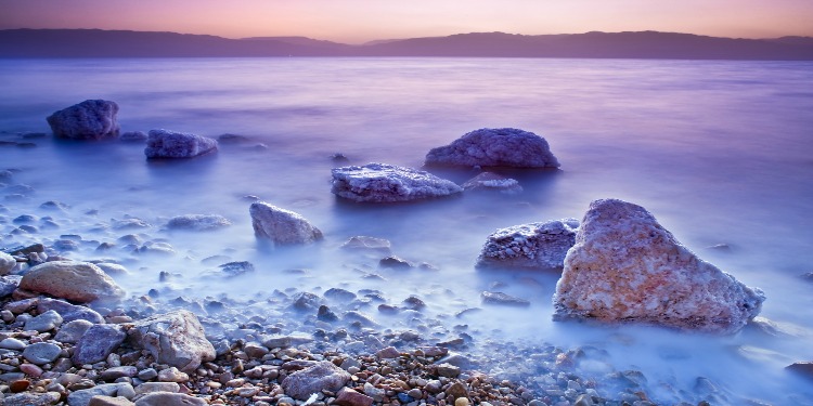 A purple and orange sunrise over the Dead Sea.