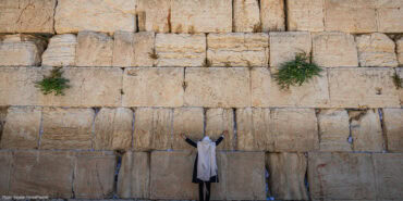 Man praying at the Western Wall - 14805267