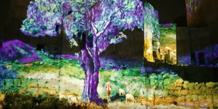 Painting of a purple tree with brick behind it.
