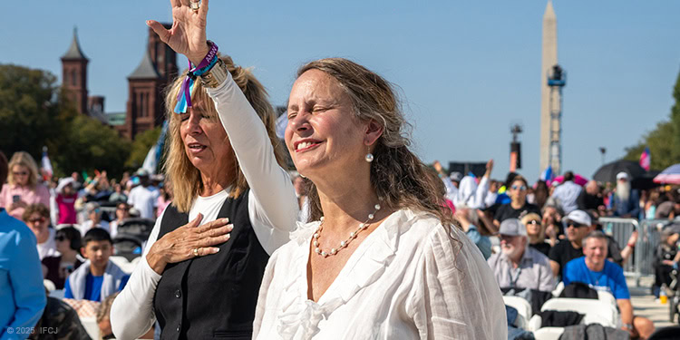 Two woman praying