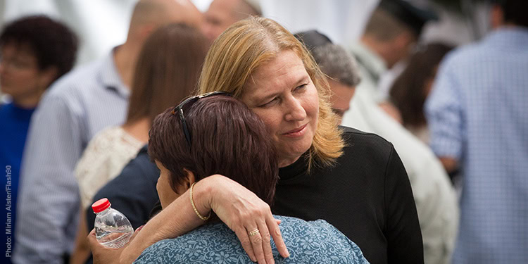 Two women hugging