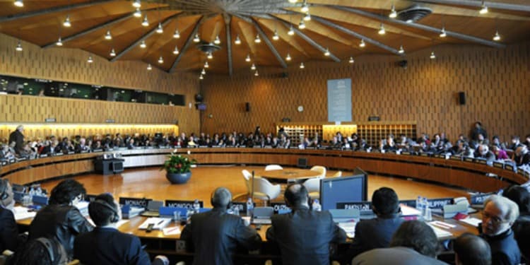 UNESCO meeting in a circular set up in a conference room.