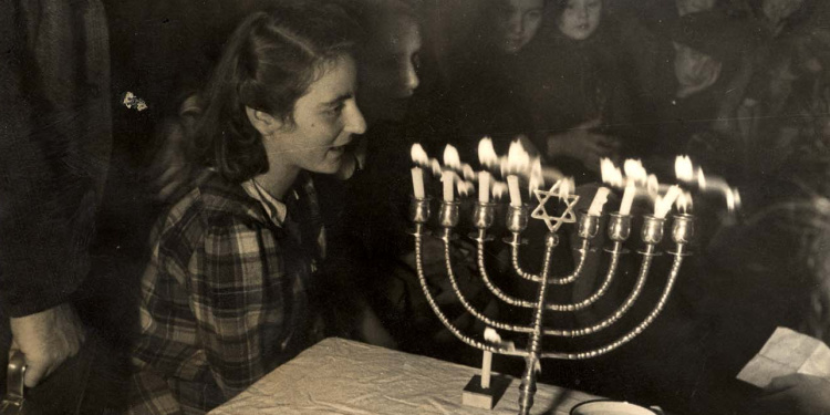 Seventh night of Hanukkah at Westerbork concentration camp during the Holocaust
