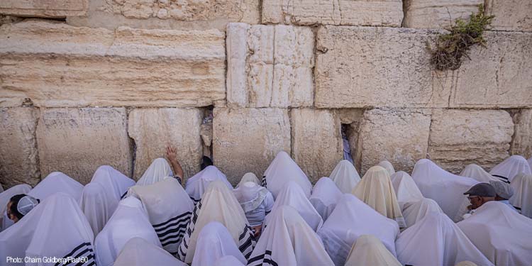 People praying at the Western Wall