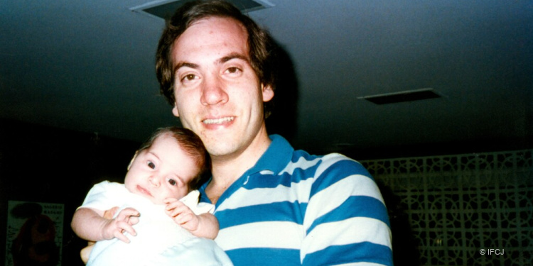 Rabbi Yechiel Eckstein holds his daughter Yael Eckstein, 1984.