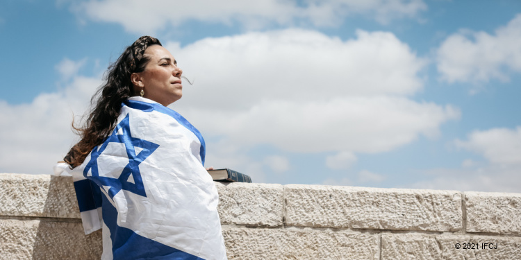 Yael Eckstein, in Jerusalem, woman with flag of Israel