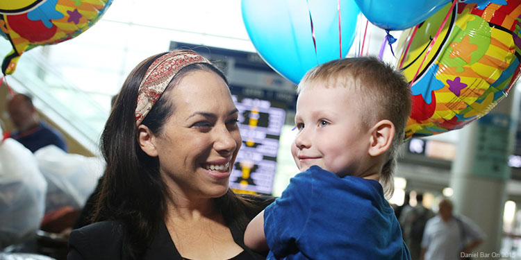 Yael with boy after freedom flight