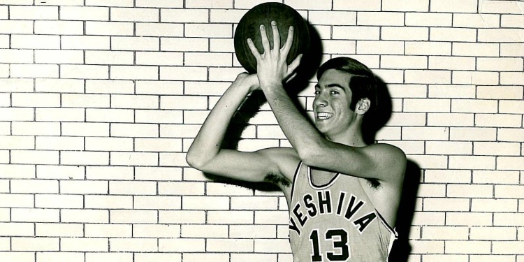 Young Yechiel Eckstein playing basketball