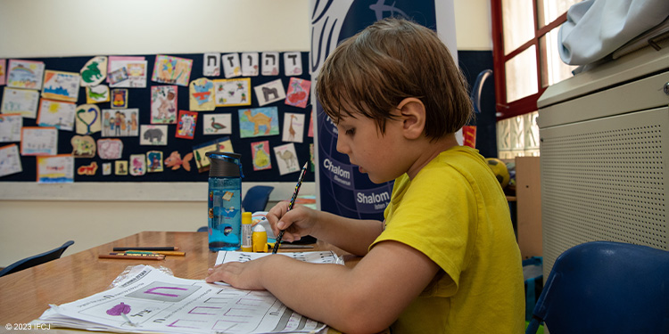 Young boy studying