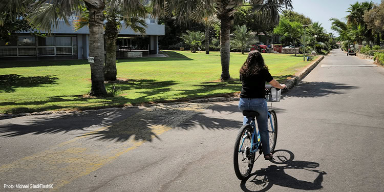 Young woman riding her bike