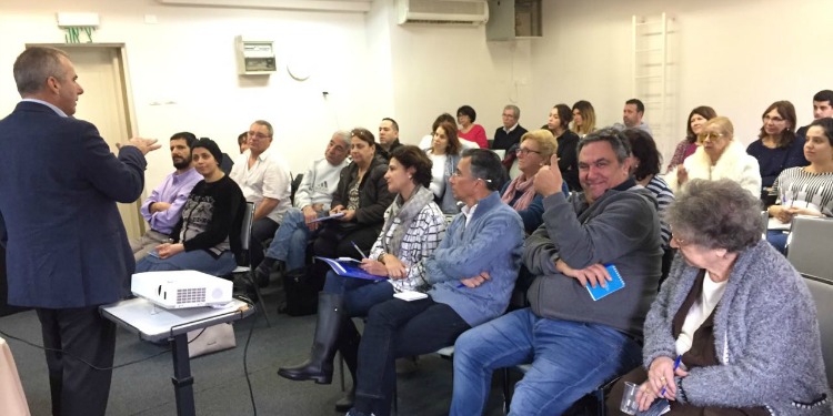 A man giving an informational seminar about Aliyah.