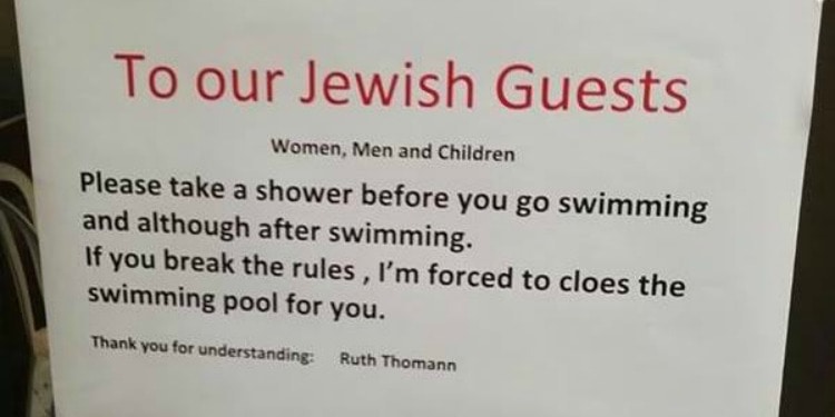 Antisemitic sign at a Swiss Hotel pool.