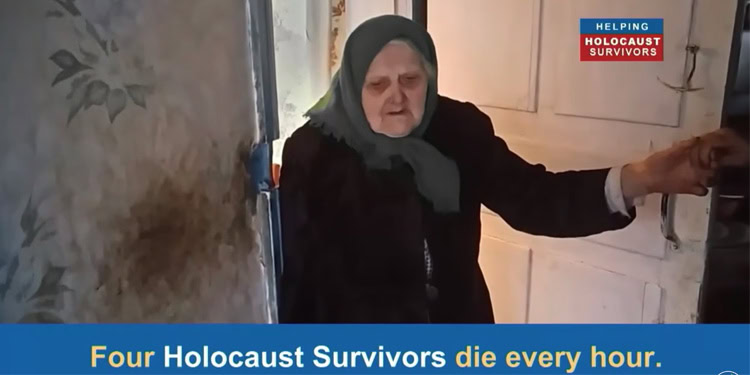 Holocaust survivor woman with gray hair and headscarf, reaching out at her home, highlighting IFCJ's support for Holocaust survivors.