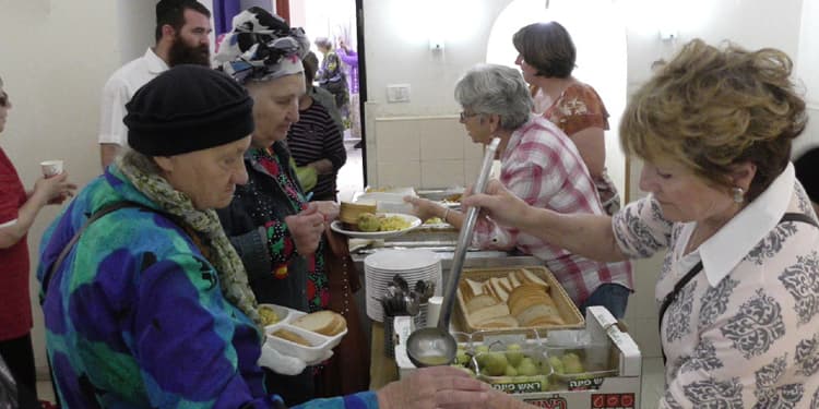 Elderly in line at one of the Eshel soup kitchens in Israel