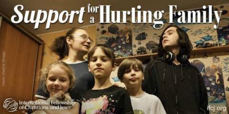 Family of five featured in an IFCJ promotion with the text: Support for a hurting family.