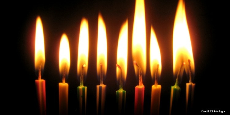 Close up image of candles lit for Hanukkah.