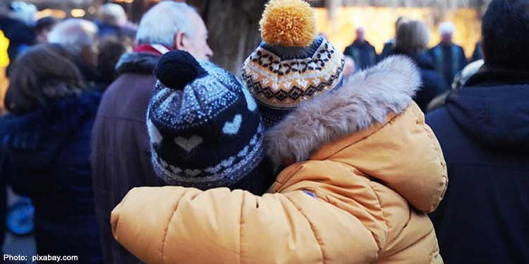 Two children hugging