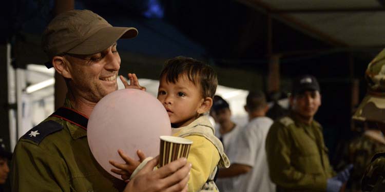 IDF soldier with young child